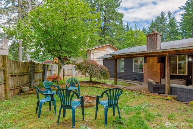 5371 Pineridge Dr NE, Bremerton, WA 98311 - view of yard featuring a patio and an outdoor living space with a fire pit