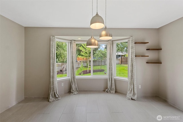 23588 Cooma Pl, Mount Vernon, WA 98274 - unfurnished dining area with baseboards