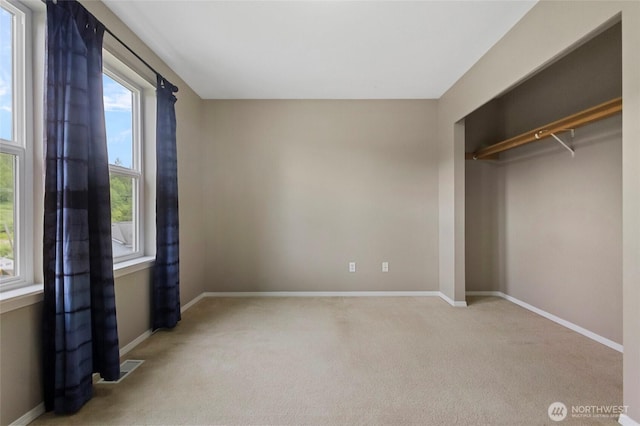23588 Cooma Pl, Mount Vernon, WA 98274 - unfurnished bedroom with carpet flooring, baseboards, and a closet