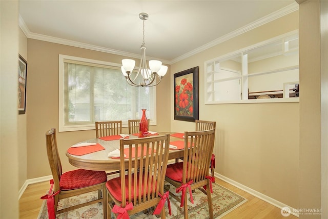 614 NW 126th Pl, Seattle, WA 98177 - dining room with wood finished floors, ornamental molding, and a chandelier