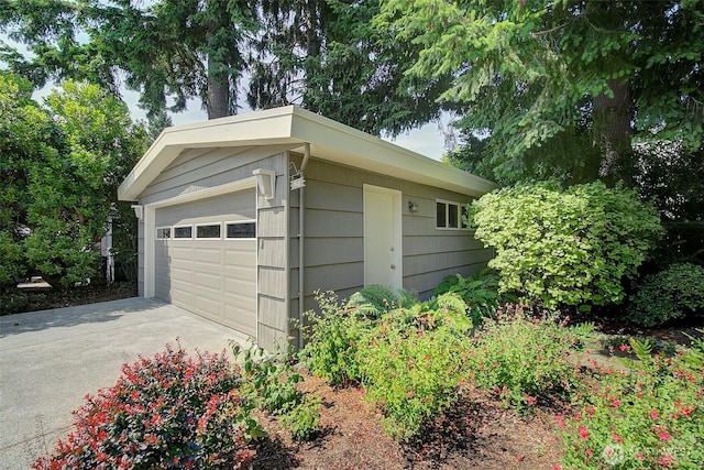 614 NW 126th Pl, Seattle, WA 98177 - detached garage featuring driveway
