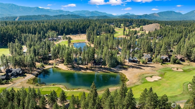 950 Coal Mine Way, Cle Elum, WA 98922 - aerial overview of property's location featuring a water and mountain view, a local golf course, and a heavily wooded area