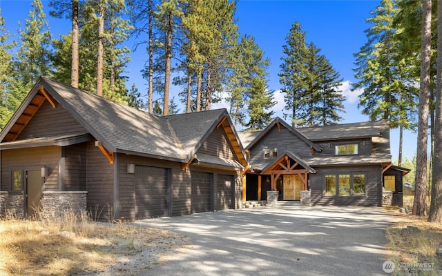 950 Coal Mine Way, Cle Elum, WA 98922 - view of front facade featuring a garage, driveway, and stone siding