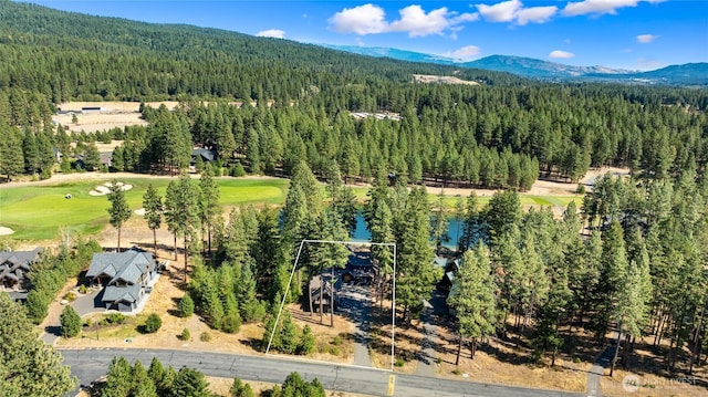 950 Coal Mine Way, Cle Elum, WA 98922 - aerial view of property and surrounding area featuring a forest, a mountain backdrop, a golf course, and property parcel outlined