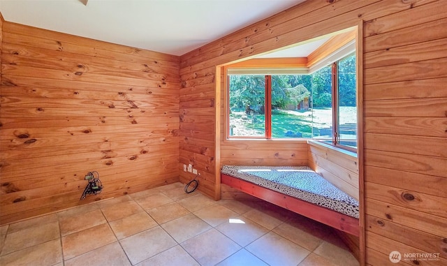 152 Richwood Ln, Lopez Island, WA 98261 - unfurnished room with light tile patterned floors and wooden walls