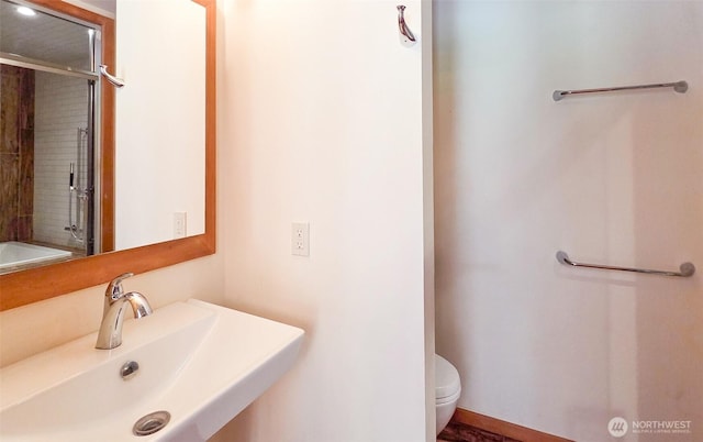 152 Richwood Ln, Lopez Island, WA 98261 - full bath featuring a sink, toilet, and a shower with shower door