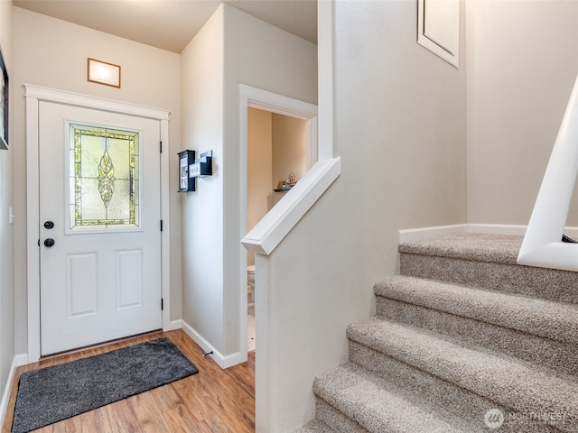 2962 26th Ave, Forest Grove, OR 97116 - entrance foyer featuring light wood-style flooring, stairs, and baseboards