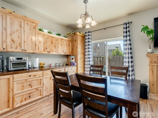2962 26th Ave, Forest Grove, OR 97116 - dining area featuring light wood-style flooring and a chandelier