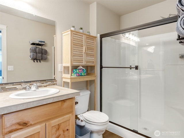 2962 26th Ave, Forest Grove, OR 97116 - bathroom with toilet, a stall shower, vanity, and tasteful backsplash