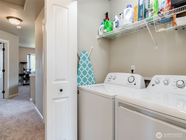 2962 26th Ave, Forest Grove, OR 97116 - laundry room with washer and clothes dryer, light carpet, and baseboards