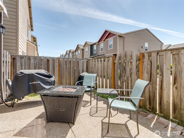 2962 26th Ave, Forest Grove, OR 97116 - fenced backyard featuring a patio, a fire pit, and a grill