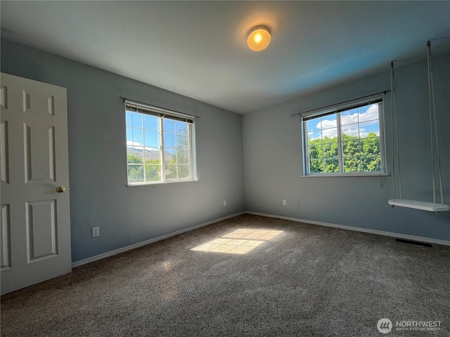 1516 4th St, Wenatchee, WA 98801 - unfurnished room featuring carpet and baseboards