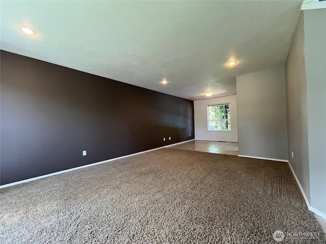 1516 4th St, Wenatchee, WA 98801 - carpeted empty room with baseboards and recessed lighting