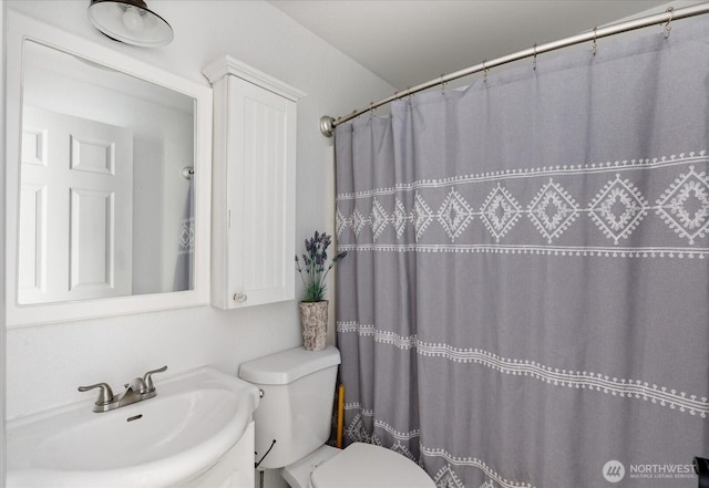 13371 Eagle St, Anacortes, WA 98221 - full bathroom featuring toilet, vanity, and a shower with curtain