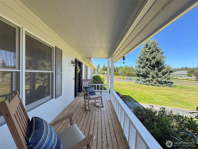 22 E Bedinger Rd, Sequim, WA 98382 - wooden porch with a yard