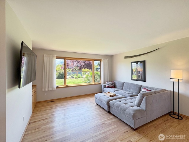 22 E Bedinger Rd, Sequim, WA 98382 - living area featuring light wood-style flooring and baseboards