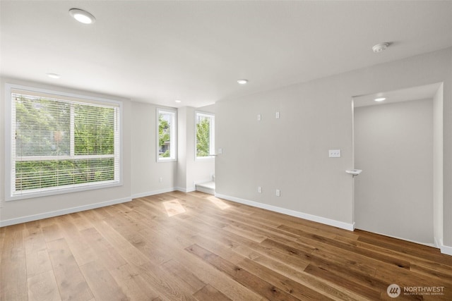 5915 Fauntleroy Way SW Unit C, Seattle, WA 98136 - empty room featuring light wood-type flooring, baseboards, and recessed lighting