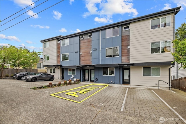 5915 Fauntleroy Way SW Unit C, Seattle, WA 98136 - view of building exterior with uncovered parking