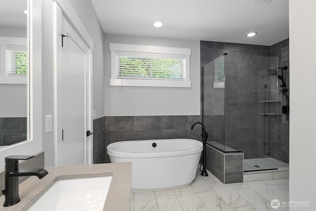 3829 95th Ave E, Edgewood, WA 98371 - bathroom featuring plenty of natural light, a shower stall, a soaking tub, vanity, and recessed lighting