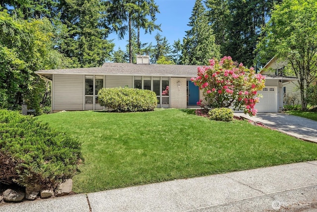14318 117th Pl NE, Kirkland, WA 98034 - view of front of home with an attached garage, a front lawn, driveway, and a chimney