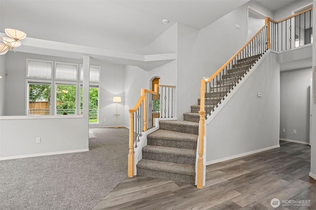 2804 177th, Vancouver, WA 98682 - staircase featuring baseboards, wood finished floors, and a towering ceiling