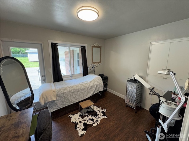 851 Heichel Rd, Camano Island, WA 98282 - bedroom featuring dark wood-style floors, access to outside, and baseboards
