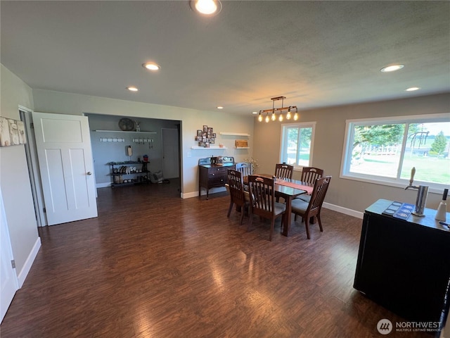 851 Heichel Rd, Camano Island, WA 98282 - dining room with recessed lighting, dark wood-style floors, and baseboards
