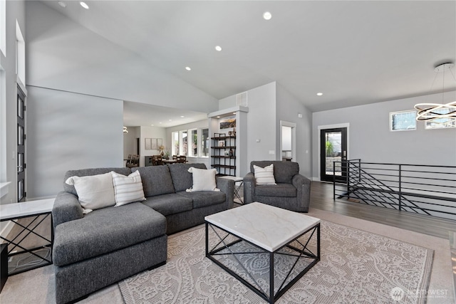 1425 Appleridge St, Wenatchee, WA 98801 - living area featuring wood finished floors, healthy amount of natural light, recessed lighting, a chandelier, and high vaulted ceiling