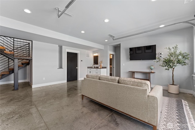 1425 Appleridge St, Wenatchee, WA 98801 - living room featuring finished concrete floors, baseboards, recessed lighting, and stairs