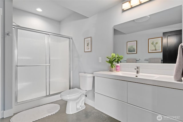 1425 Appleridge St, Wenatchee, WA 98801 - full bath with toilet, vanity, a shower stall, baseboards, and recessed lighting