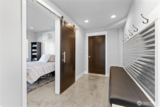 1425 Appleridge St, Wenatchee, WA 98801 - hall with a barn door, recessed lighting, finished concrete flooring, and baseboards