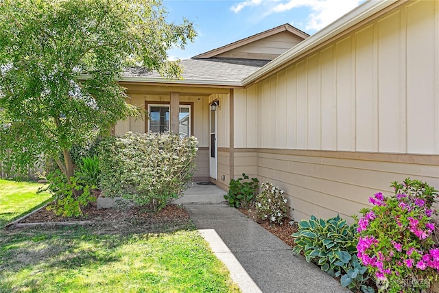 7382 Halibut Dr, Blaine, WA 98230 - property entrance with roof with shingles and a yard
