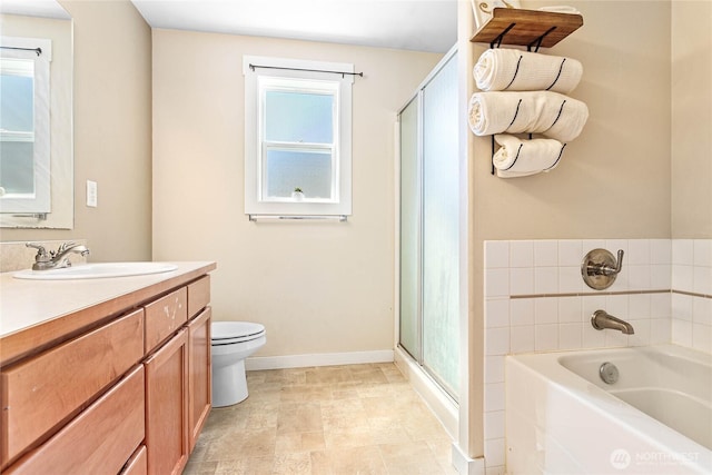 7382 Halibut Dr, Blaine, WA 98230 - bathroom with vanity, a garden tub, toilet, baseboards, and a shower stall