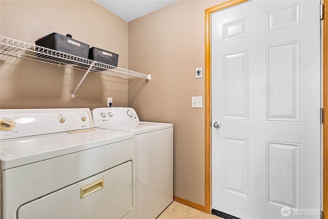 7382 Halibut Dr, Blaine, WA 98230 - laundry room with washer and dryer and baseboards