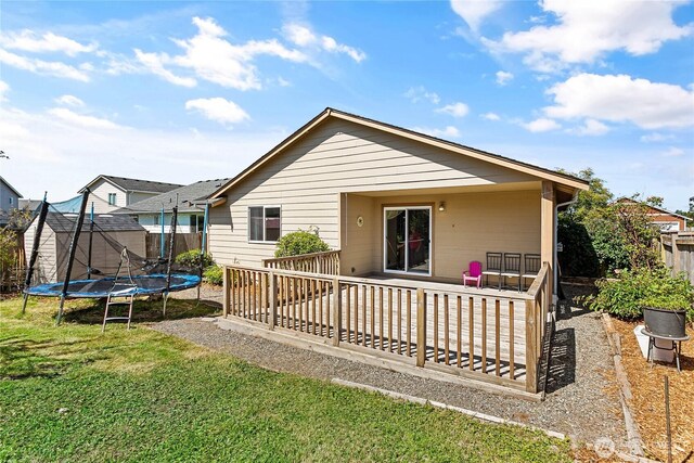7382 Halibut Dr, Blaine, WA 98230 - back of house with a trampoline and a deck