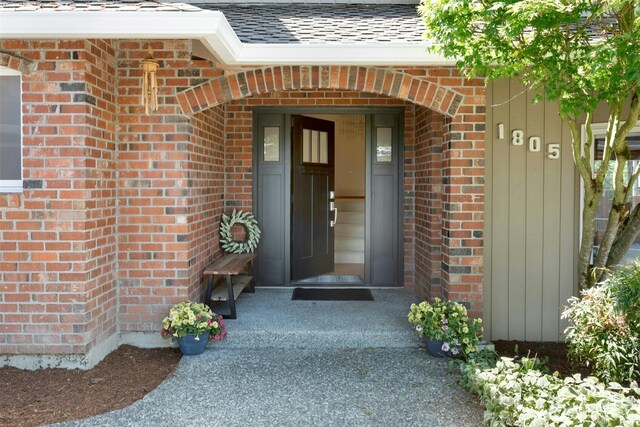 1805 179th Pl NE, Bellevue, WA 98008 - property entrance featuring brick siding and a shingled roof