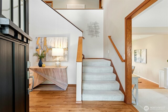 1805 179th Pl NE, Bellevue, WA 98008 - stairs featuring wood finished floors and baseboards