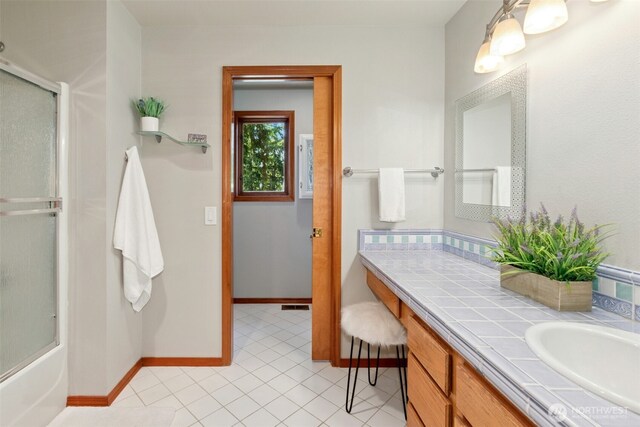 1805 179th Pl NE, Bellevue, WA 98008 - bathroom with vanity, tile patterned floors, combined bath / shower with glass door, and baseboards