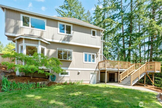 1805 179th Pl NE, Bellevue, WA 98008 - rear view of property featuring stairs, a wooden deck, a lawn, and a shingled roof