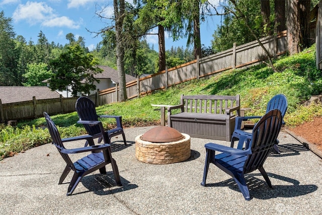 1805 179th Pl NE, Bellevue, WA 98008 - fenced backyard featuring a fire pit and a patio area