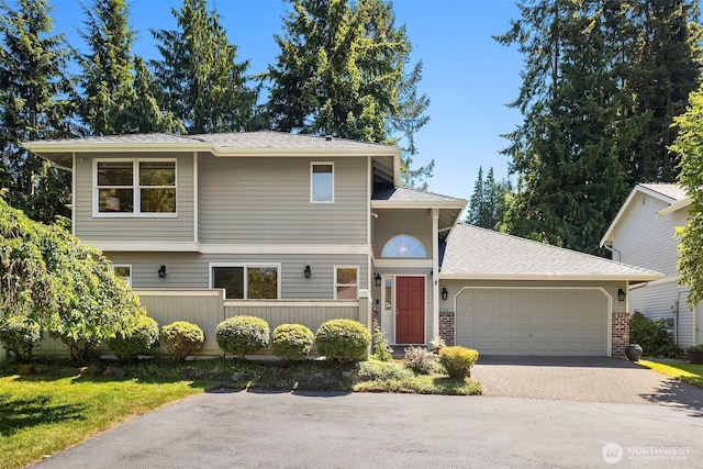 1211 6th Pl S, Edmonds, WA 98020 - view of front of house featuring driveway, a garage, and brick siding