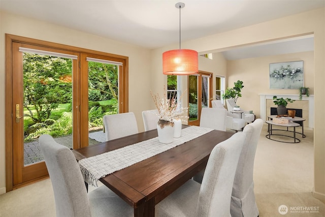 1211 6th Pl S, Edmonds, WA 98020 - dining room featuring light colored carpet and baseboards