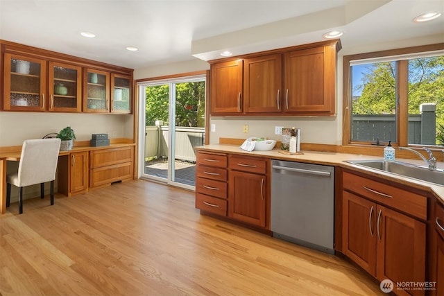 1211 6th Pl S, Edmonds, WA 98020 - kitchen featuring dishwasher, a sink, healthy amount of natural light, brown cabinetry, and recessed lighting