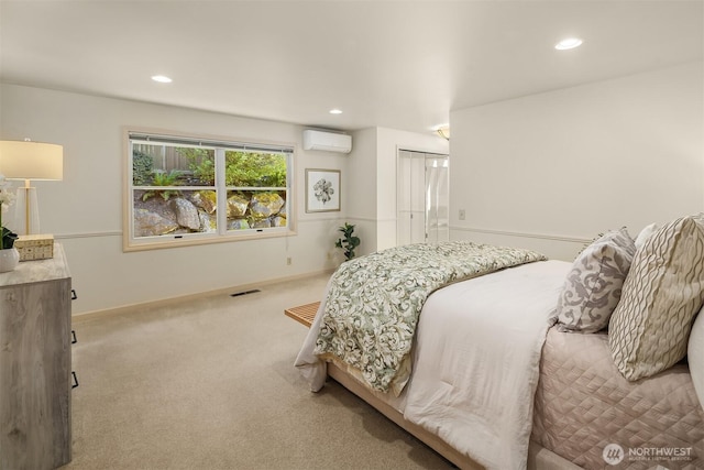 1211 6th Pl S, Edmonds, WA 98020 - bedroom featuring a wall unit AC, carpet flooring, recessed lighting, and baseboards
