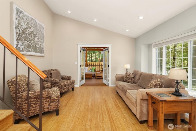 23018 NE 25th Way, Sammamish, WA 98074 - living room featuring healthy amount of natural light, light wood-style flooring, recessed lighting, lofted ceiling, and baseboards