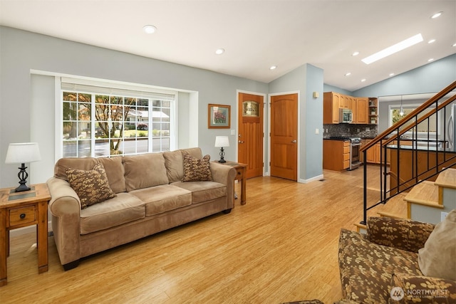 23018 NE 25th Way, Sammamish, WA 98074 - living room with light wood-style floors, stairway, recessed lighting, and vaulted ceiling