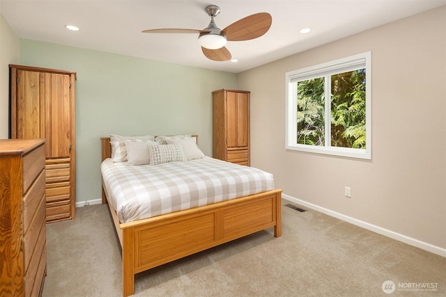 23018 NE 25th Way, Sammamish, WA 98074 - bedroom with light colored carpet, baseboards, recessed lighting, and a ceiling fan