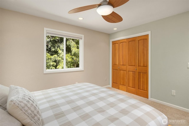 23018 NE 25th Way, Sammamish, WA 98074 - bedroom with carpet floors, a closet, a ceiling fan, baseboards, and recessed lighting