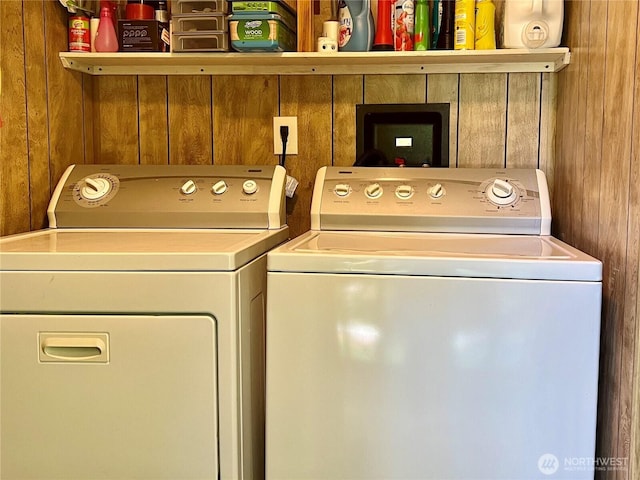 1911 324th, Long Beach, WA 98631 - washroom with separate washer and dryer and wood walls