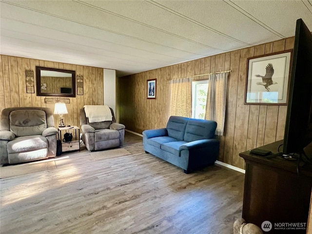 1911 324th, Long Beach, WA 98631 - living room featuring wooden walls and wood finished floors